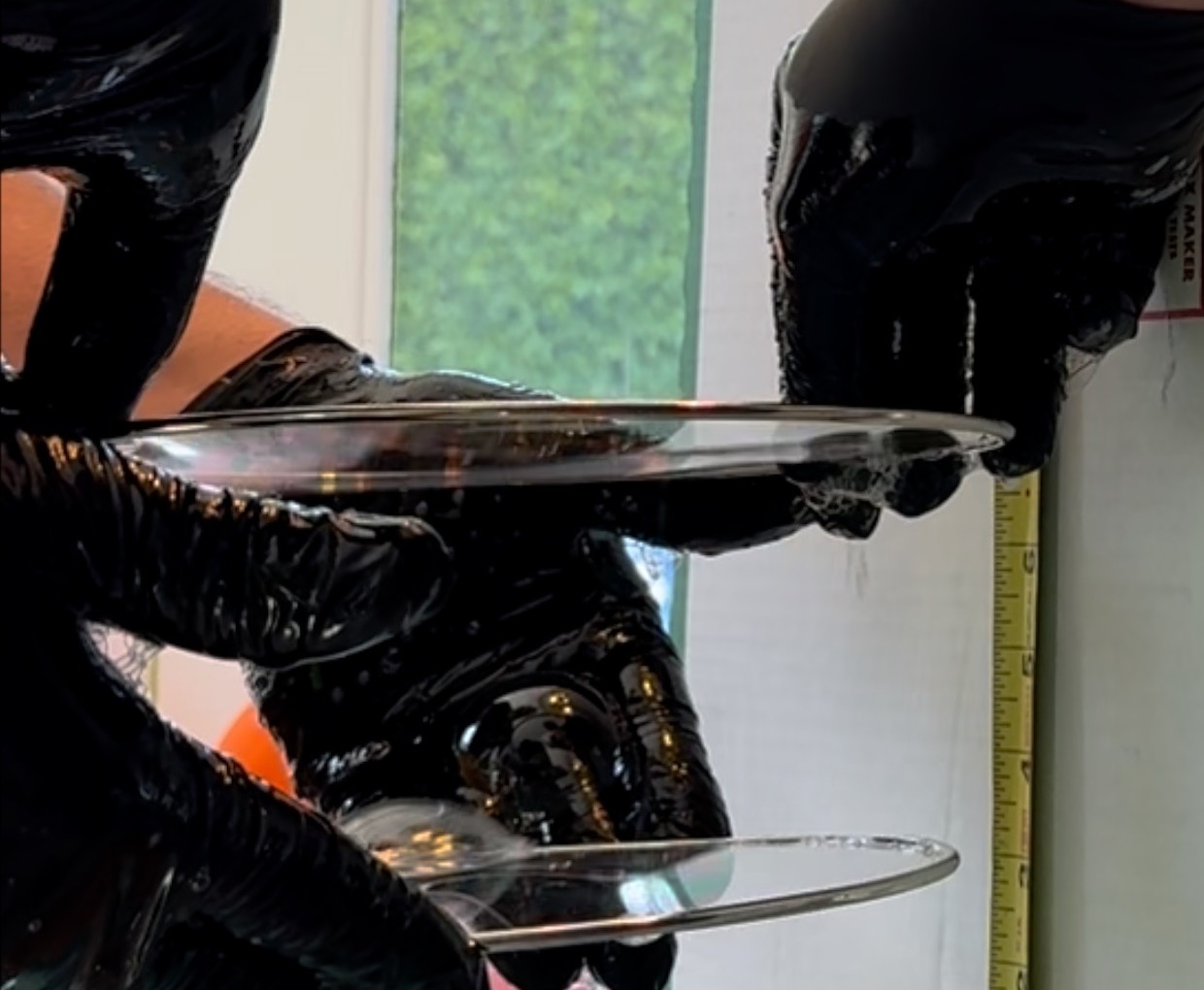 The soap film moments after the pop, in flight toward the two disks